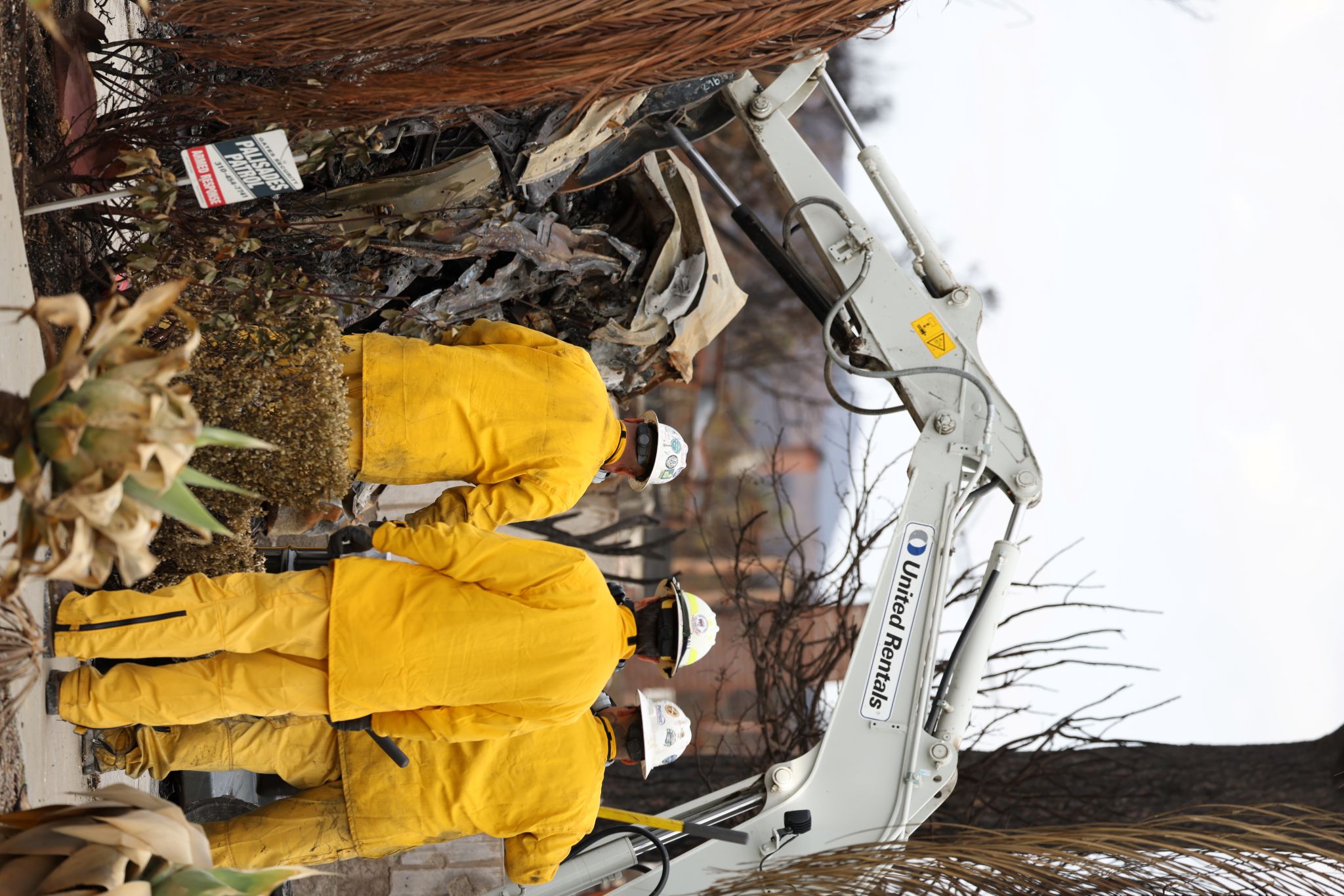Contractor crew cleaning up fire debris